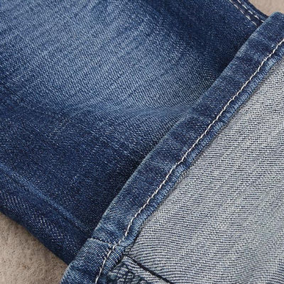 Bon prix Le tissu de denim de bout droit de mèche de 4 manières pour les hommes stigmatisent les jeans 373gsm en ligne
