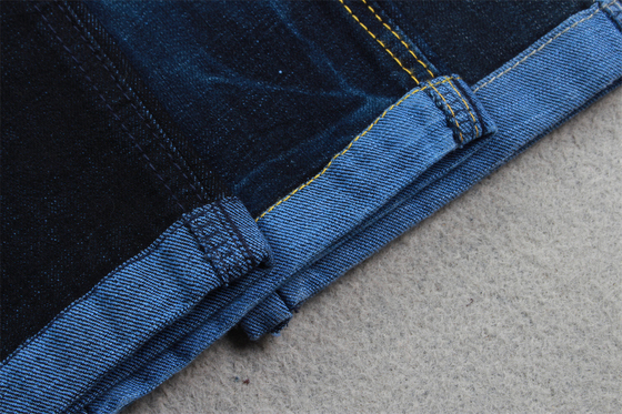 11 oz de tissu en denim bleu avec une bande transversale pour les jeans pour hommes, couleur bleu noir de marque.