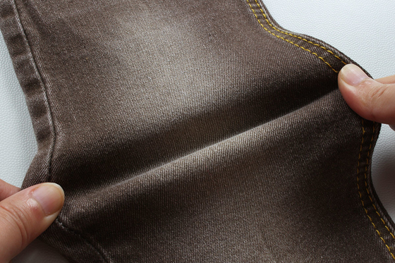 Tissu en denim super brun pour les femmes Jeans homme bas prix compétitif de la ville de Foshan Chine