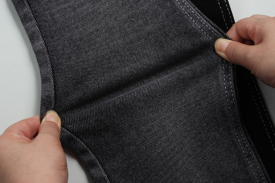 11 oz Tissu en denim à étirement bas Pour le travail de l'homme porter des jeans Noir arrière Prix compétitif de Weilong Textile