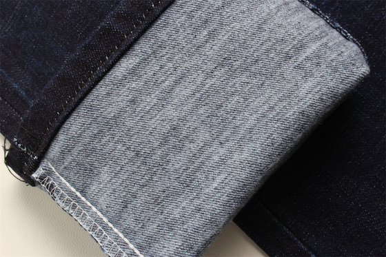 11.8 Oz Cross Slub coton mélangé spandex bleu denim tissu pour homme Jeans étirer style de marché de l'Inde Desizing Fleecing