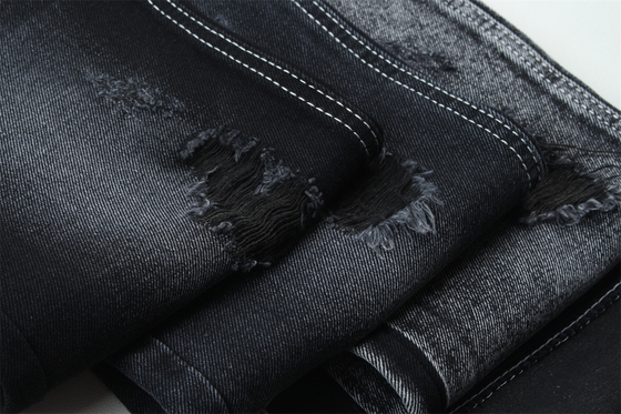 11.5oz Tissu denim rigide 56%C 44%P Noir et noir arrière pour le style de la marque Jeans style ami garçon Soft touch