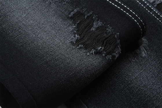 11.5oz Tissu denim rigide 56%C 44%P Noir et noir arrière pour le style de la marque Jeans style ami garçon Soft touch