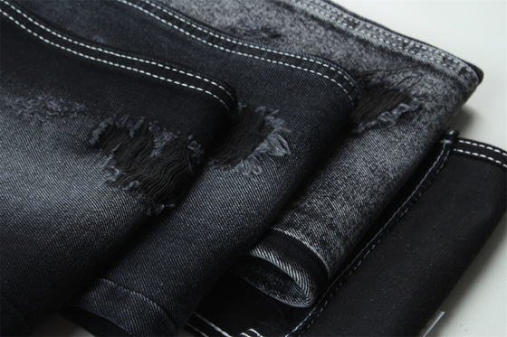 11.5oz Tissu denim rigide 56%C 44%P Noir et noir arrière pour le style de la marque Jeans style ami garçon Soft touch