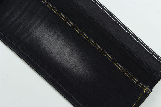 Tissu denim slub extensible noir foncé pour jeans enfants et femmes