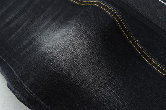 Tissu denim slub extensible noir foncé pour jeans enfants et femmes