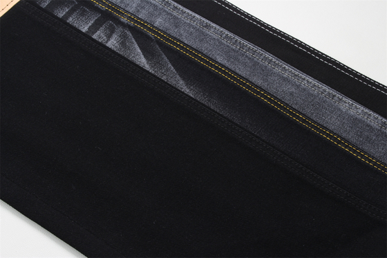 Tissu denim noir 10.5oz rigide 100% coton noir et envers noir pour jeans style boyfriend, toucher doux pour femmes