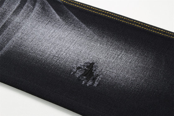 Tissu denim noir 10.5oz rigide 100% coton noir et envers noir pour jeans style boyfriend, toucher doux pour femmes