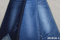 Le sanforisage étirable boudinent le tissu de denim de 10 onces pour les jeans maigres de femmes d'hiver de ressort