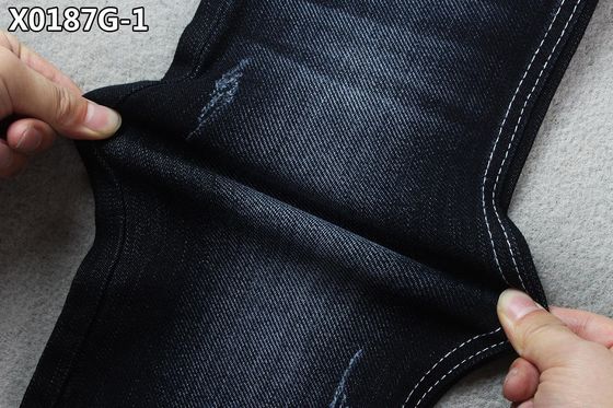 Petit pain de tissu de texture de tissu de jeans de sergé de main gauche pour l'usage de femmes