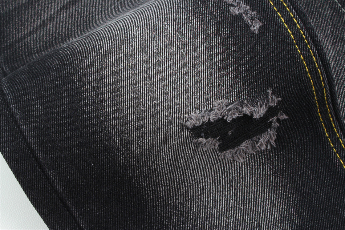 11 oz de denim rigide 56%C 44%P Noir et noir arrière largeur 180cm