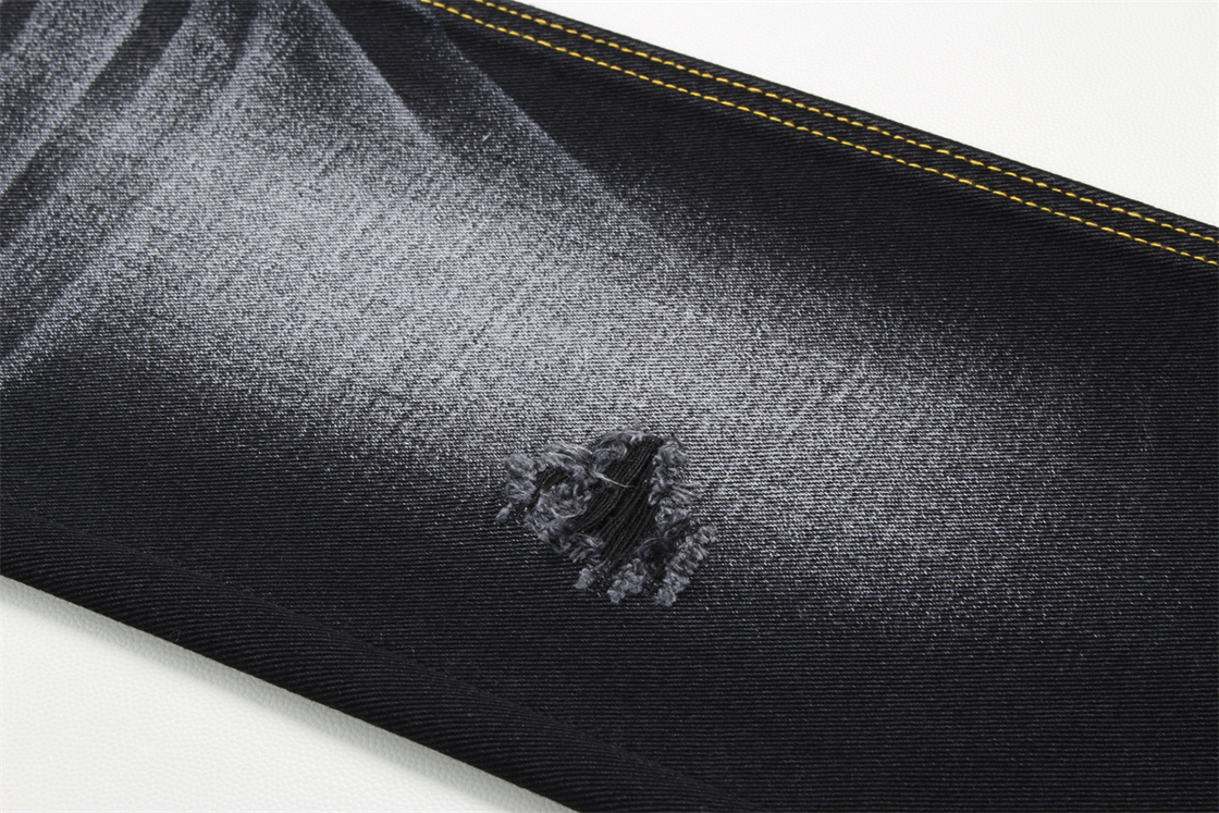 Tissu denim noir 10.5oz rigide 100% coton noir et envers noir pour jeans style boyfriend, toucher doux pour femmes