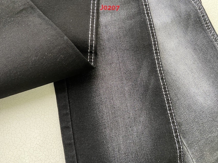 Tissu de haut de denim de noir de bout droit de 10,2 onces pour le pantalon de fille de jeans de femmes