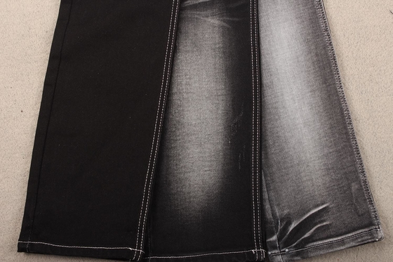 Fleur imprimant la main de noir de soufre de couleur sentant le tissu mou de denim