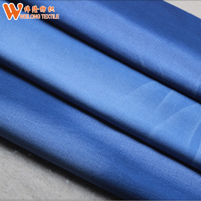 Fabricants visqueux bleus colorés de tissu de denim de bout droit de coton