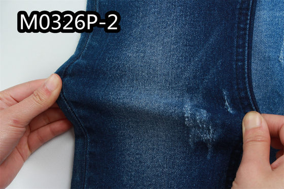 Bon prix le tissu de denim de l'indigo 10oz pour des femmes équipent le Spandex mou cru du coton 2% de 98% en ligne