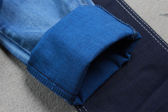 Bon prix 9-10 oz Tencel denim tissu pour les femmes jeans haute étirement pour la haute qualité jeans de marque de Guangdong Chine usine en ligne