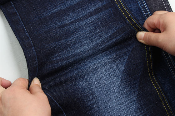 Bon prix 11.8 Oz Cross Slub coton mélangé spandex bleu denim tissu pour homme Jeans étirer style de marché de l'Inde Desizing Fleecing en ligne