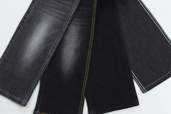 Tissu denim slub extensible noir foncé pour jeans enfants et femmes