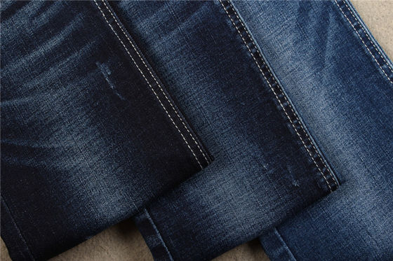 Bon prix Matériel extensible de jeans de tissu de denim de contre-taille de polyester du coton 28% de l'indigo 10oz 70% en ligne