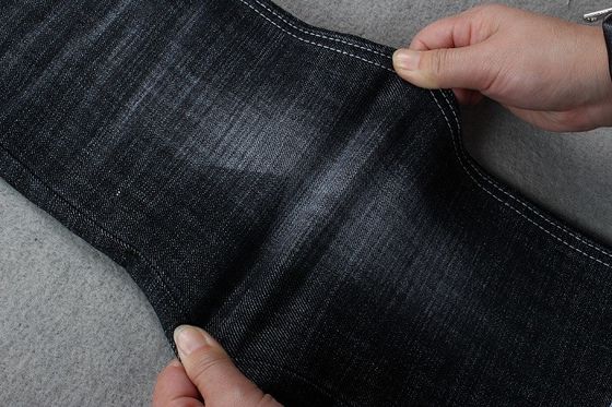 Tissu de denim de Spandex de polyester de coton de GOTS 12.8Oz pour des jeans Stocklot d'homme de femme
