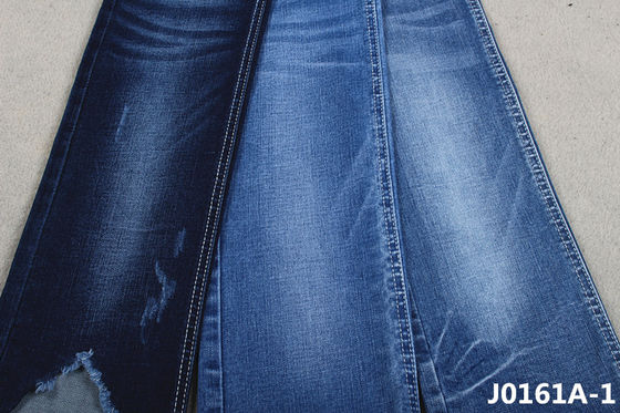 Bon prix Le sanforisage étirable boudinent le tissu de denim de 10 onces pour les jeans maigres de femmes d'hiver de ressort en ligne